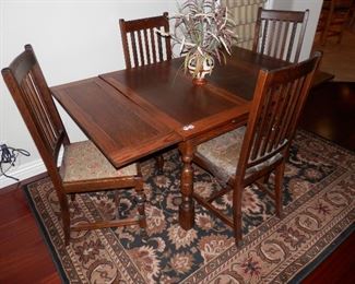 $350 Solid Oak Pub Table and 4 chairs.....5' x 7' woven rug $95.....LIKE NEW!   CJ  (760) 445-8571