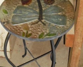 Dragon fly outside round small table