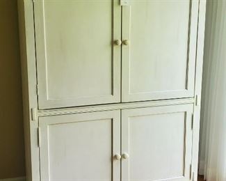 $125 - 4 door media cabinet 67” tall x 49” W x 23” Deep.          40” inside clearance 