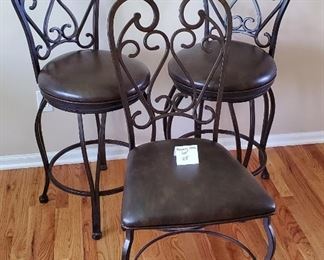 $130 - 2 (27" tall seat level) Swivel Bar Chairs & one matching table chair 