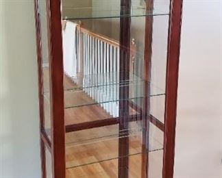 $225 - Philip Reinisch Co. Lighted Curio Cabinet with sliding door 76”T x 30” W x 12 ½” D 