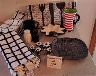 $15 - Misc. black & white kitchen items, including 5 kitchen towels and one washcloth