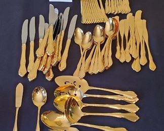 $100 - Oneida Craft Deluxe Gold-tone Flatware. Serving for 12 and serving pieces. 80 pieces total. 12 small forks, 12 large forks, 24 small spoons, 12 table knives, 12 butter knives & 8 serving pieces.