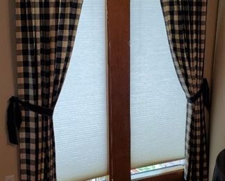 $10 - 5 pc. curtain set. (next photo also). 2 84" panels with 2 pull backs and one valance. There is some sun fading on the back of the curtains.