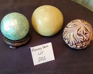 $7 - Pier 1 ball decor on stand, 5" round candle (wick removed), and a decorative ceramic ball.