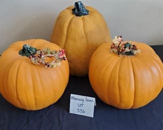 $8 - Plastic Pumpkins. Largest one is 10" tall