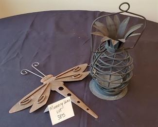 $10 - Dragonfly wall decor (14" long) & outdoor metal pineapple candle holder (13" tall)