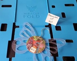 $20 - Miracle Fold Laundry/clothes folder and a butterfly scarf hanger