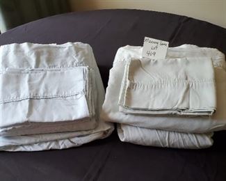 $12- 2 DKNY 4-pc queen sheet sets (Lightly used!)