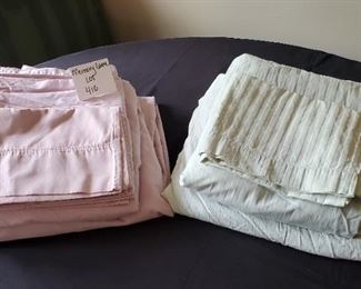 $11 - 2 queen sheet sets. Pink one is a 4 pc. DKNY & mint green one is a 3 pc (only one pillowcase) Devatex set.