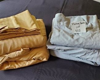 $13 - 2 Queen sheet sets. The brown set is a 6 pc set and the gray set is a 4 pc set. (gray pillowcases are not pictured but are included)