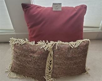 $12 - 3 pillow. The largest one is 22"