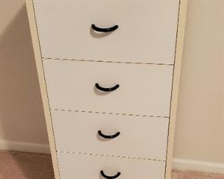 $24 - White chest of drawers 43"T x 17"W x 18"D Stain in bottom drawer