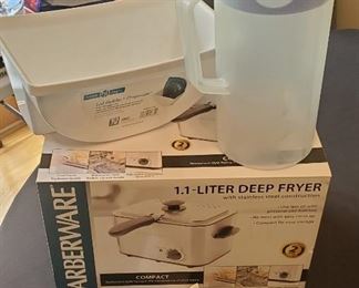 $12 - Deep Fryer (lightly used), Home Logic lid holder & organizer and a pitcher