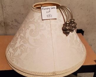 $12 - 2 Lamp shades (12"T x 21"W) and a pair of curtain hooks