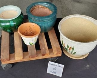 $10 - 4 small pots and a plant dolly