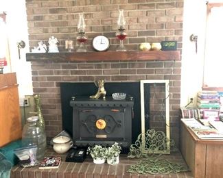 Vintage oil lamps, metal art pieces, Gem Dandy Electric churn, boot match holder and more