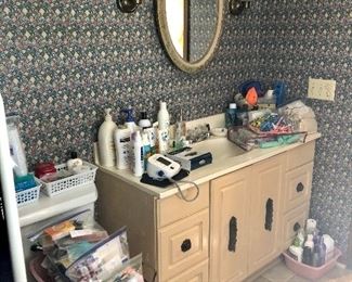 Full bathroom: bag lots of toiletries, curlers, shampoos...