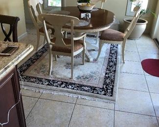 Kitchen table set with four chairs asking $395.