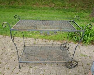 $48 Large Tea Cart one wheel is stuck and the rubber oart has slipped off the wheel