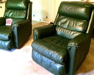 PAIR of green leather recliners...looks like they have never been sat in!