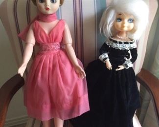 Antique dolls.... look at that pink chiffon dress!