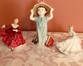 More wonderful figurines! "Kirsty" on the left.  "Ninette"on the right .  "Make Believe" in the middle.  ALL by Royal Doulton. Made in England.