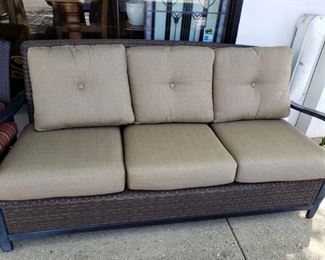 Outdoor sofa with cushions. 76"W x 30"D x 35"H, 20" seat height, 26" arm height. $250.00
