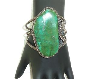 Signed R Otten with a sunrise symbol.  Gorgeous OLD cuff bracelet weighs 42 grams.