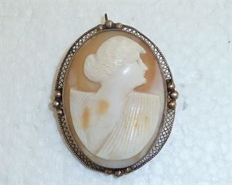 Large lovely vintage cameo.  True carved shell with gilded silver filigree surround.  1 5/8" tall.   Can be worn as pin or pendant.  $119