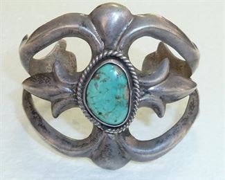Very old heavy (90g) sand cast turquoise Native American bracelet. $525