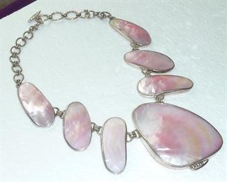 Signed AF 925.  Perfect pink blush Mother-of-pearl and Sterling silver huge necklace.  Center piece is 3" tall.  $245
