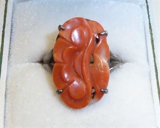 Vintage carved coral ring set in Sterling silver.  Size 5.5  $95