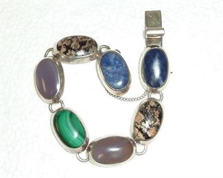 Sterling silver, Lapis, Malachite, Jasper, and other natural stones bracelet.  Signed TP-06, Mexico, and 925.   Weighs 41g.  $135