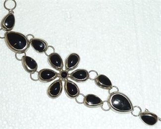 Big statement silver and Onyx flower bracelet is 1 3/4" wide.  Marked MEXICO.  $118