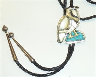 Sterling inlaid bird bolo is 2.5 inches tall, with Mother-of-pearl, turquoise and onyx stones.  $145
