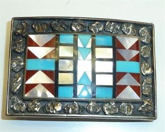Vintage inlaid belt buckle signed STERLING HANDCRAFTED, and JM. It is 2.5" by 1 3/4", and weighs 35g.  $245