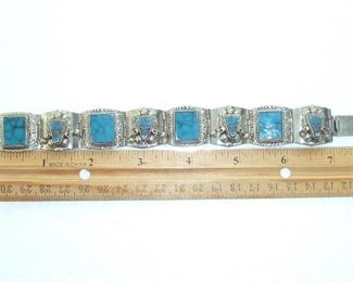 Alpaca silver and carved turquoise bracelet 7/8" wide.  $65