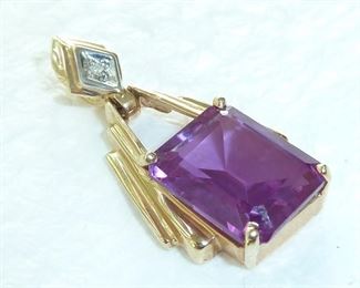 Amethyst, Diamond and 14k gold pendant.  It is 1 1/8" tall by 3/8" wide. Weighs 2.8g.  Beautiful.  $138