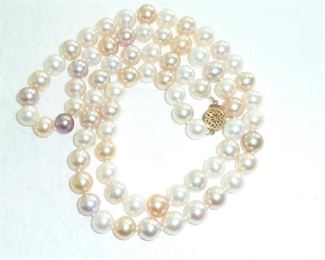 Genuine hand knotted large 6-7mm multi color blush pearls with a 14k gold clasp.  25" long.  Every woman needs pearls for weddings, funerals, and court appearances :-)  $199