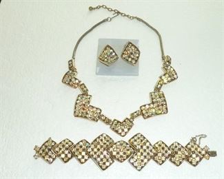 Vintage yellow aurora borealis rhinestone necklace, bracelet and earrings set.  Bracelet is 1 3/4" at widest point.  $128