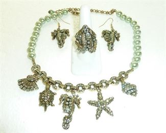 Heidi Dauss Seahorse necklace earrings and ring set is much prettier and sparkly in person.  $195   