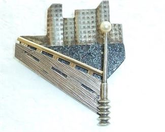 Large 2 1/4" Sterling and brass Cityscape pin.  $68
