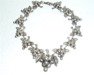 WOW...handmade 1940s Mexican silver grape cluster necklace.  Marked MEXICO and SILVER.  Middle grape is 1 3/4" tall.  Weighs 58g.   $275