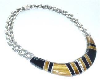 This incredibly well made, thick chunky tiger's eye, onyx  and Sterling silver necklace is marked TS-105, MEXICO and 950, which is higher quality than 925 sterling.  It weighs a massive 155 grams.  $459