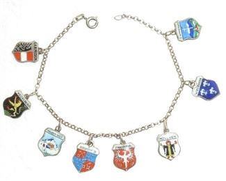 Classic enamel travel charms from German cities on a silver bracelet.  All charms are marked 800, and bracelet 835.  $98