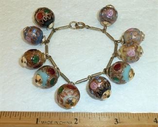 Vintage old brass and glass Venetian wedding cake bead bracelet.  $98