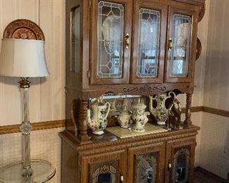 China cabinet Which matches the oak dining room table which seats six and has one leaf