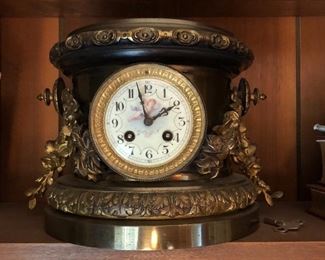 Bronze and mantle clock are sold as a set. 