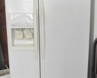 Whirlpool side by side refrigerator. $100
